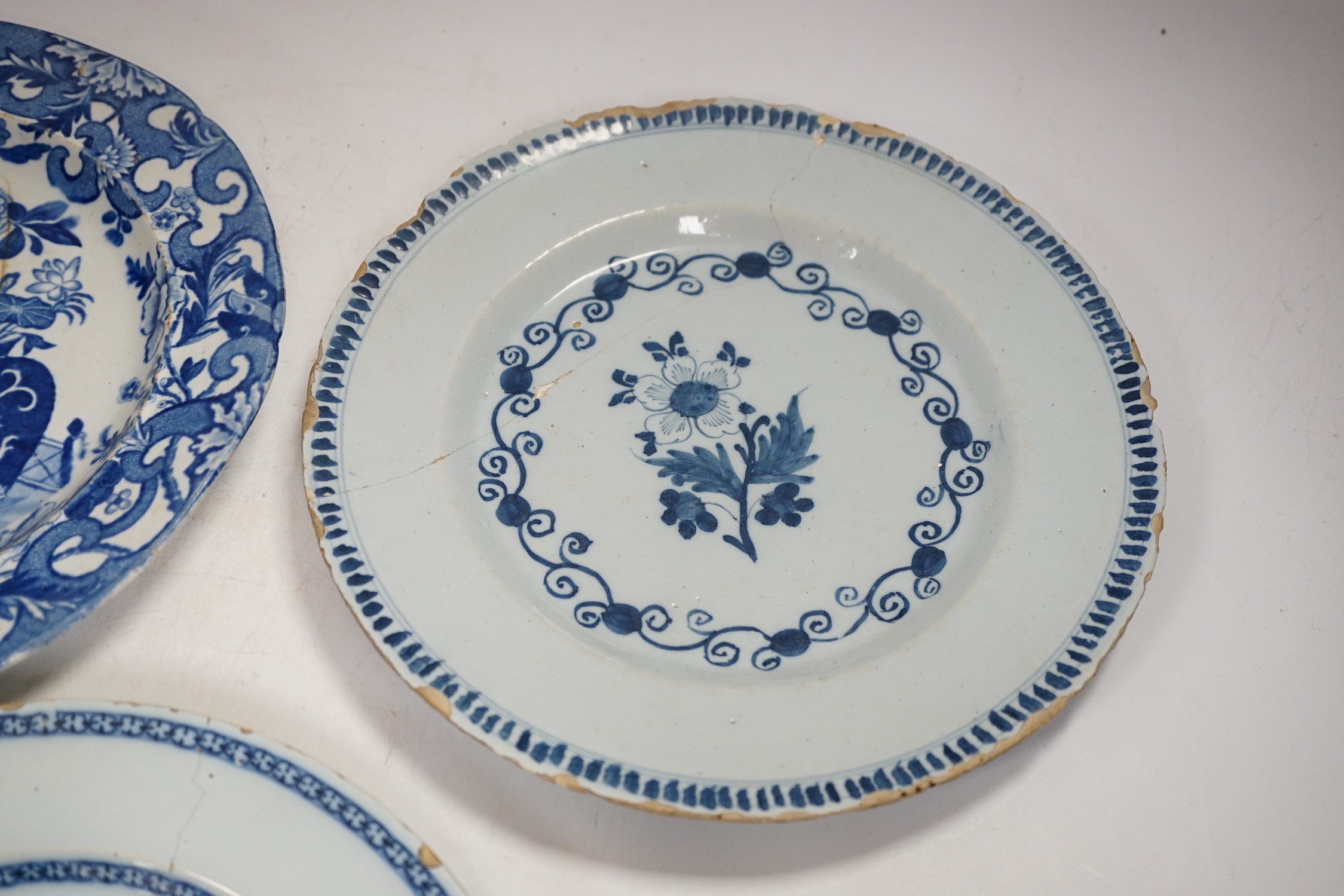 Two 18th century Delft plates and a 19th century Masons ‘Crown Inn’ plate-24cm diameter